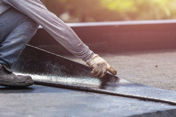 Professional Exterior Waterproofing technician working in Bristow, VA